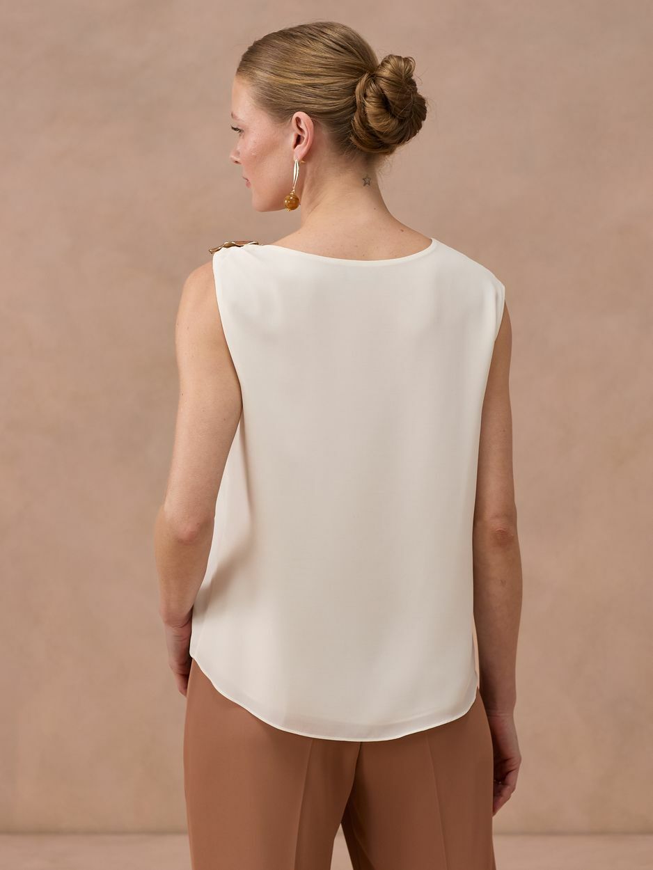 BLUSA COM MANGA ASSIMETRICA BL260106